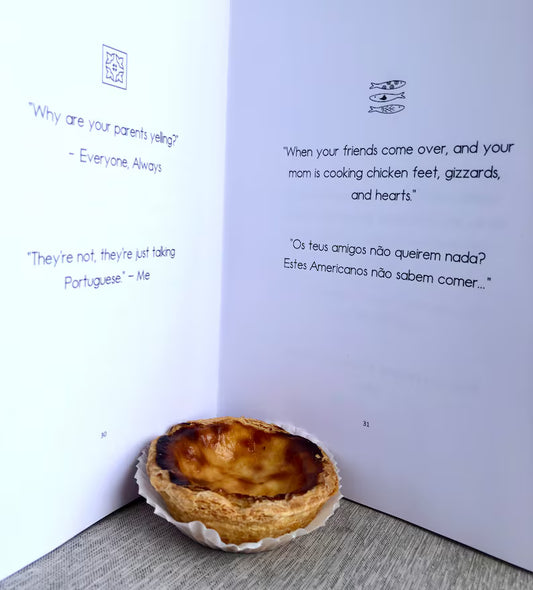 Portuguese egg tart on a book with text